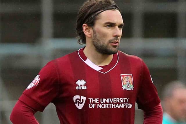 Cobblers playmaker Ricky Holmes