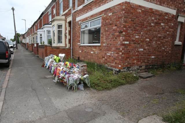 Flowers left in Charles Street, Kettering, after fatal accident on Tuesday, June 23, 2015 NNL-150625-144808001
