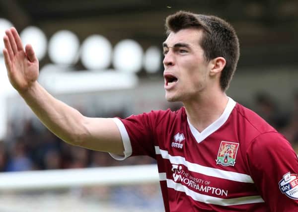 COMMITMENT - John Marquis impressed during his first spell at the Cobblers in 2014