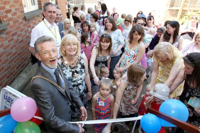 Northampton Friends Meeting House, Wellington St.
Ribbon cutting by Mayor Roger Conroy and Mayoress Jenny Conroy to re-open the baby cafe. ENGNNL00120120525142112