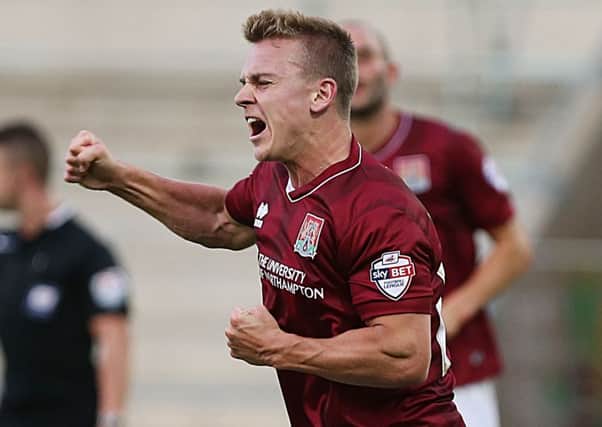 Cobblers striker Sam Hoskins has signed a contract to stay at Sixfields until the summer of 2018