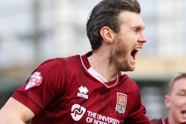 HAPPY MAN - Cobblers central defender Zander Diamond