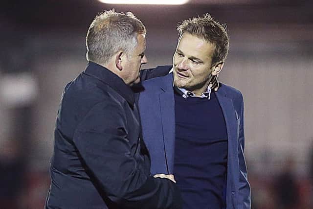 MUTUAL RESPECT - Cobblers boss Chris Wilder and AFC Wimbledon counterpart Neal Ardley
