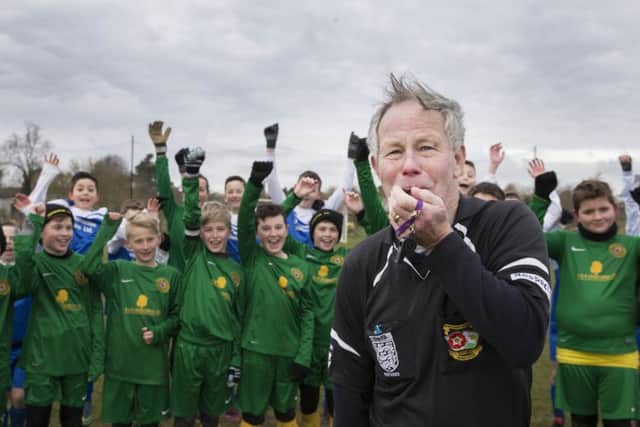 Kislingbury Football Club, Beech Lane. Guard of honour for referee Ron McCahill for his last-ever match (Kislingbury v Inspiration FC under 12's) after 60 years. NNL-160228-130921009