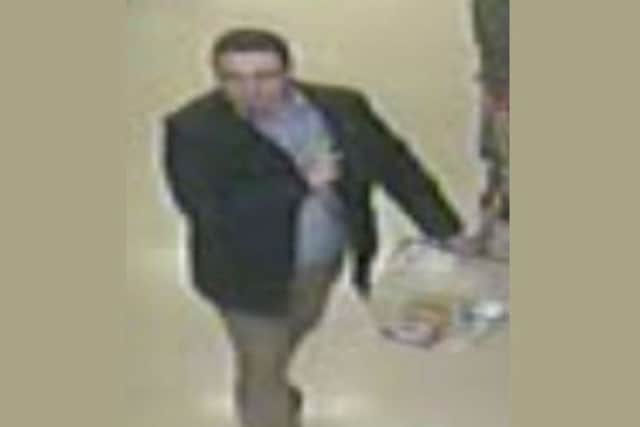 A CCTV image of the man police want to talk to in relation to the theft