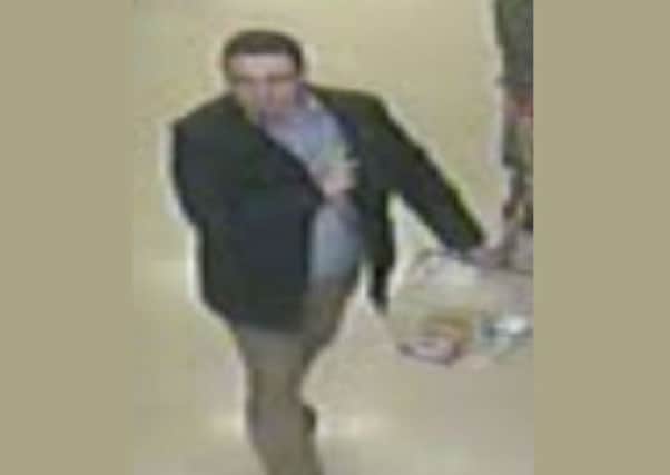 A CCTV image of the man police want to talk to in relation to the theft
