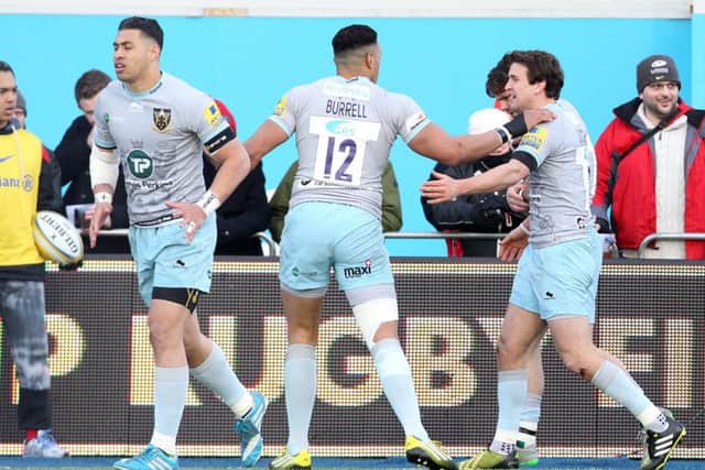Lee Dickson (right) scored for Saints in the win at Saracens (picture: Sharon Lucey)