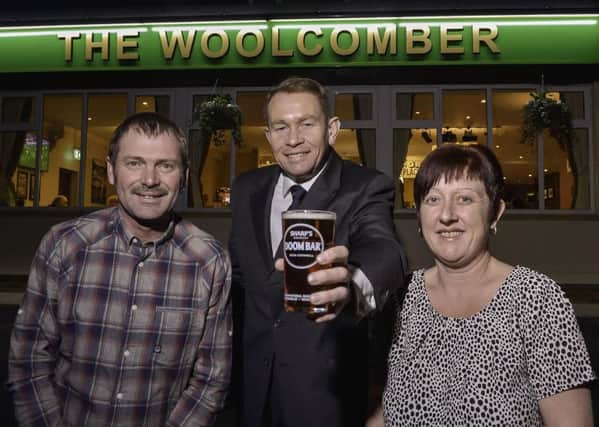 Publicans of The Woolcomber Stuart and Donna Rebhan with Kettering MP Philip Hollobone