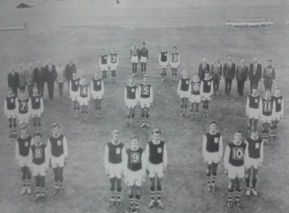 An unusual squad photo taken at the County Ground as the club prepared for Division One.