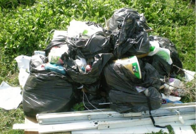 The fly-tipped waste at Ditchford Lakes car park