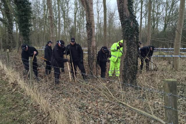 Police searching woodland near Warkton this morning
