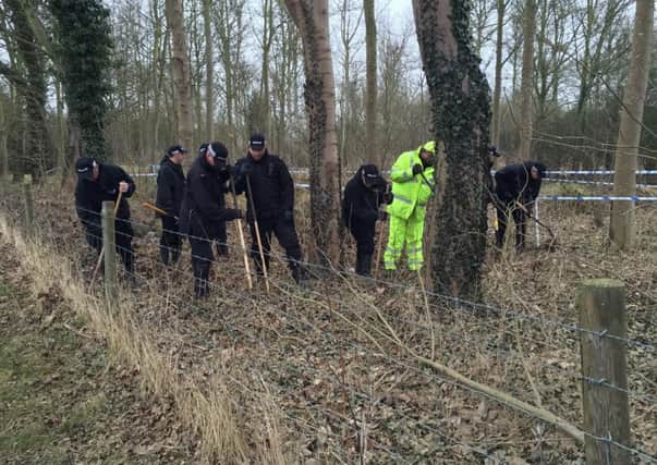 Police searching woodland near Warkton this morning