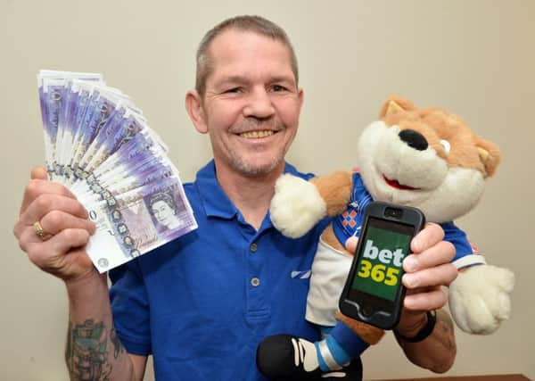 Leicester City supporter...John Sharman of Desborough is hoping to cash in if Leicester City can win the premiership.
PICTURE: ANDREW CARPENTER
