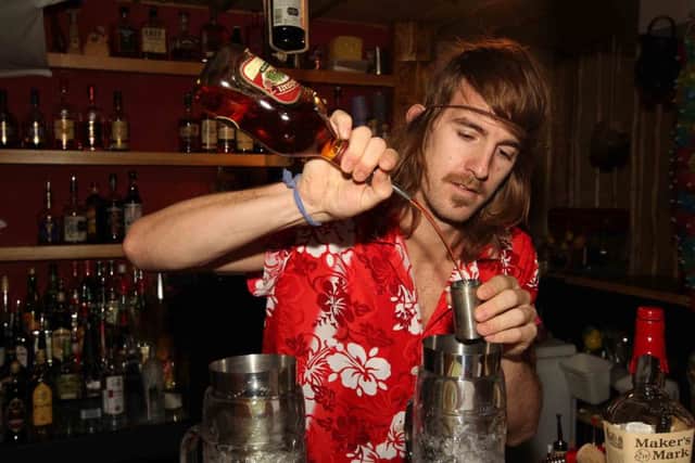 Sam Dale, co-owner of Hakamou, making cocktails. ENGNNL00120111130165734