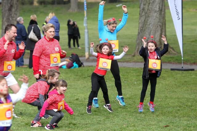 The warm up before the Sport Relief run at Becket's Park. NNL-160321-020916009