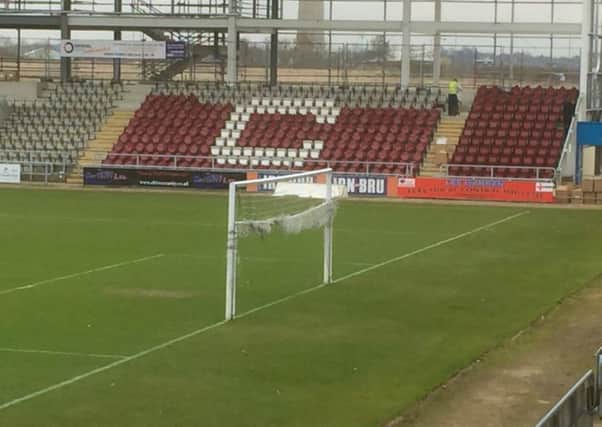 Claret seats are being installed in the East Stand at Sixfields today.