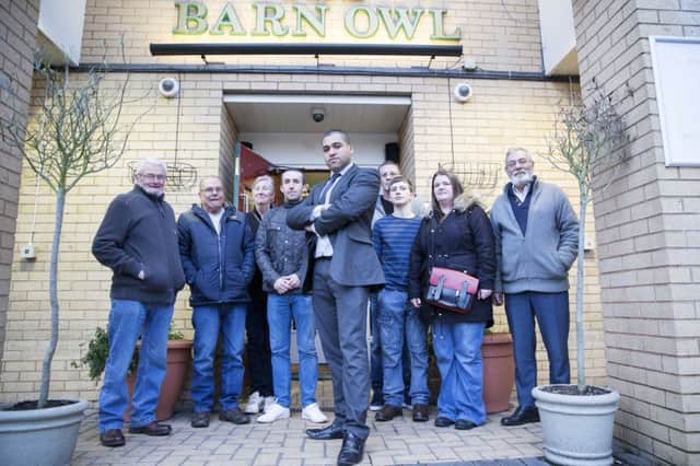 Councillor James Hill - outside the Barn Owl in Rectory Farm. Hawthorn Leisure wants to turn the pub into a shop...but hundreds of residents don't want it to happen NNL-160113-170338009