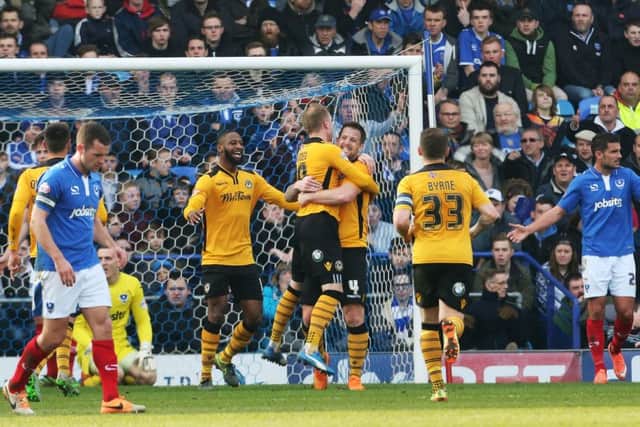 UPSETTING THE ODDS - Newport celebrate one of their goals in their impressive 3-0 win at Portsmouth 10 days ago