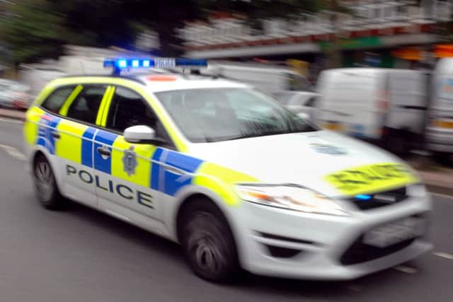 Three men have been arrested and charged after a burglary incident at a Wellingborough shop.