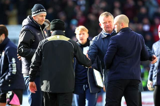 Chris Wilder and Adam Murray shake hands before Monday's clash (pictures by Sharon Lucey)