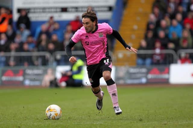 Ricky Holmes scored one, hit the bar and set up Hoskins for what should have been the winner as a second-half sub on Monday (pictures by Sharon Lucey)