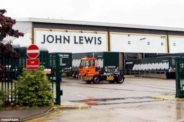 A gang of five men stole Â£200,000 worth of goods from the John Lewis warehouse in Northampton