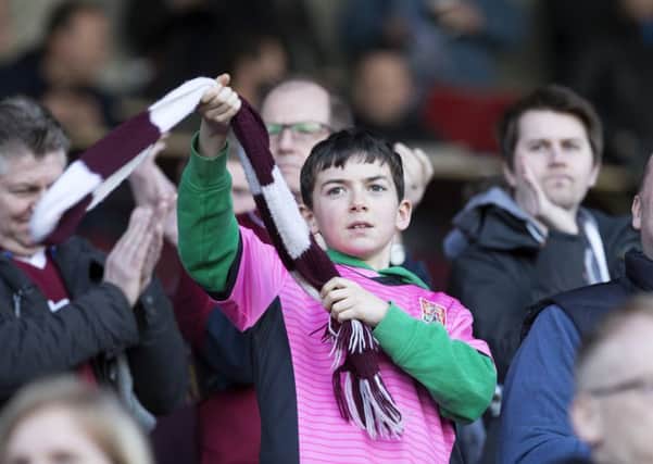 REASON TO BE CHEERFUL - the Cobblers have frozen season ticket prices for next season (Pictures: Kirsty Edmonds)