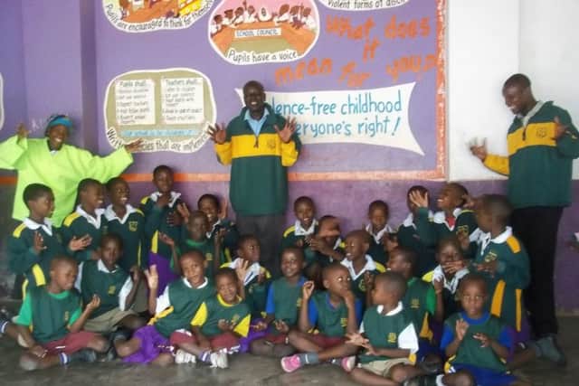 Great Houghton Prep School may have shurt down two years ago - but its uniforms have found a new home at the Outspan school in Uganda.