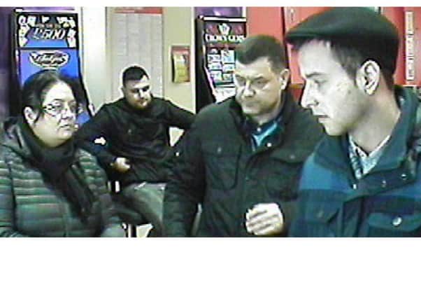 A CCTV image of the four people police believe may have information about the incident.