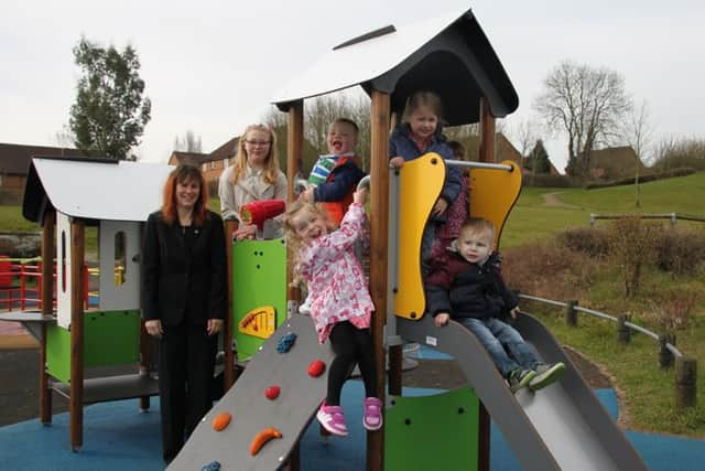 Trying out the new play equipment with DDCs Contracts and Performance Officer Julie Lewis are youngsters Caoimhe and Oisin Adams, Sofia Borhina, Abi Laidlaw and Elise and Ryley Becheley-Gordon.