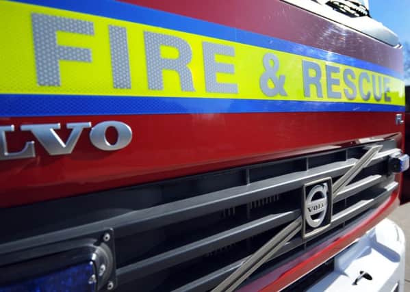 The 35-year-old from Kettering was arrested after a blaze broke out at a property in Donaldson Avenue, Broughton, at about 1am.