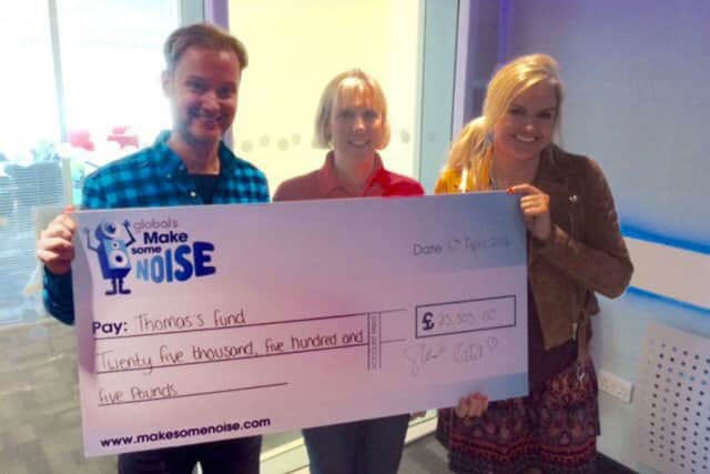 Heart Four Counties Breakfast Show presenters Stuart Miles and Katy Hill handed over a cheque for Â£25,000 to Thomas's Fund