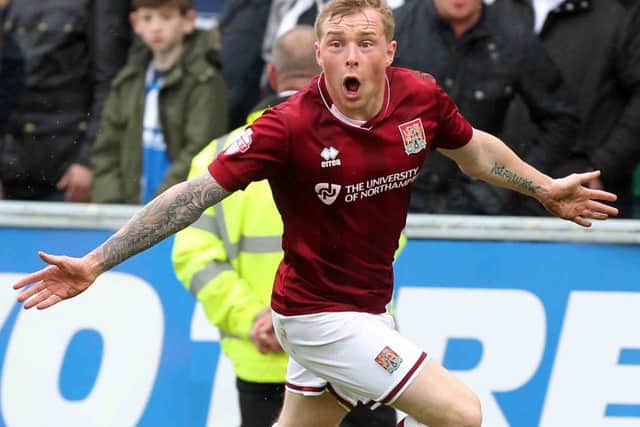 GET IN THERE! - Nicky Adams celebrates firing the Cobblers into the lead against Bristol Rovers (Pictures: Sharon Lucey)