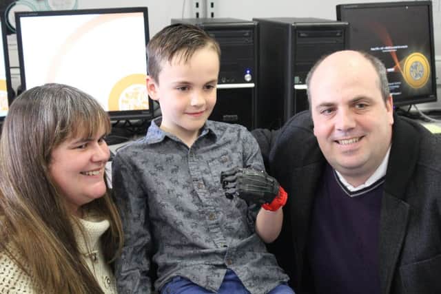 Will with his mum and dad