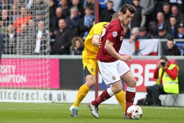 John Marquis in action against Bristol Rovers