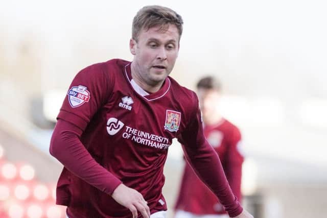 Cobblers midfielder Joel Byrom