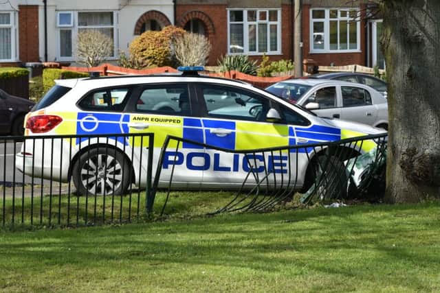 A police car responding to an emergency was involved in a crash in Northampton this afternoon (Sunday).