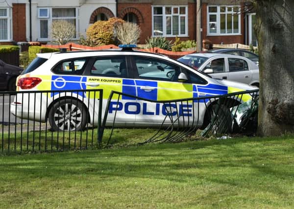 A police car responding to an emergency was involved in a crash in Northampton this afternoon (Sunday).