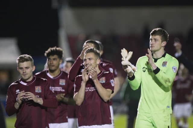21-UP - the Cobblers players celebrate their win over Crawley Town on Tuesday night