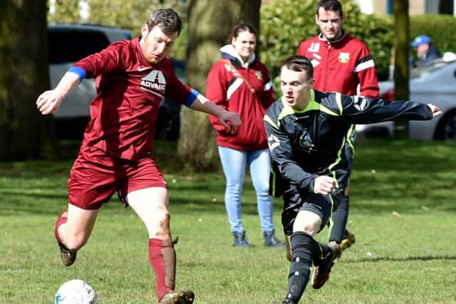 Action from the clash between Abington and AFC Thorpe (Pictures: Dave Ikin)