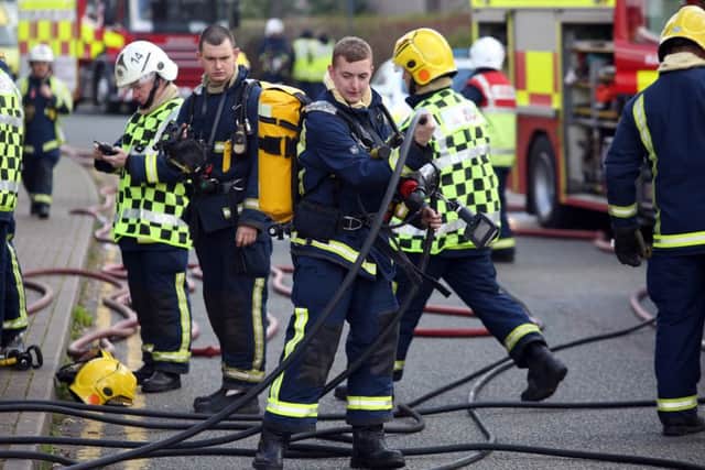 Fire crews, police officers and ambulance personnel attend a scenario created for a training exercise at Nene Park