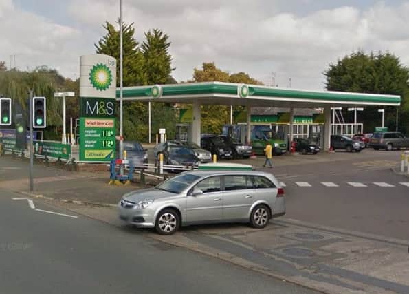 Police are appealing for witnesses after a paramedic was hit by a car by this BP garage in Kingsthorpe.