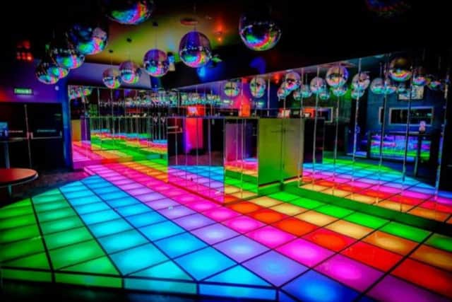 Fever & Boutique has two different rooms of music