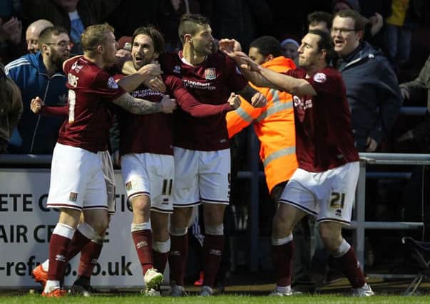 GROUP EFFORT - Ricky Holmes says he has been able to shine for the Cobblers due to the great form of his team-mates