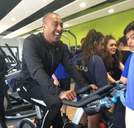Colin Jackson has officially opened a new Â£2 million sports centre at Pitsford School