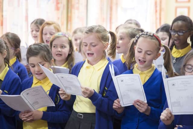 Cynthia Spencer Hospice - Whitehills Primary School pupils sing happy birthday on hospice's 40th birthday and tree planting by High Street Minister Marcus Jones NNL-160429-151001009