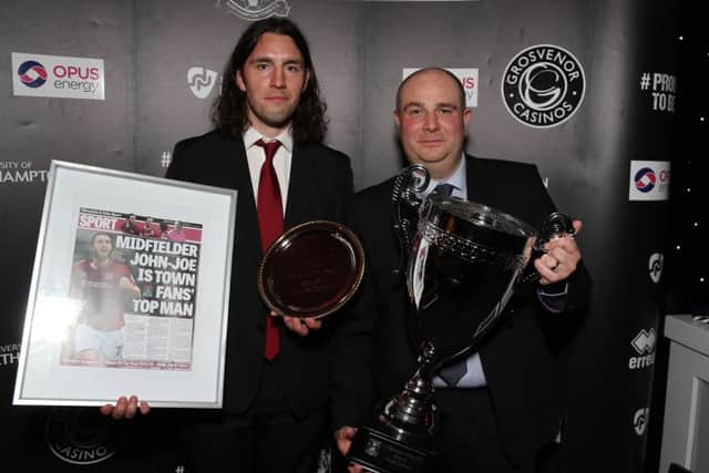 HE'S GOT AWARDS, LOTS OF AWARDS - John-Joe O'Toole is pictured alongside Tom Jennings, who presented the player with his prizes for winning the Chronicle & Echo Supporters' Player of the Year award (Picture: Pete Norton)