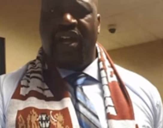 NBA legend Shaquille O'Neal sings We are the Champions to Northampton Town fans in his latest Cobblers posting.