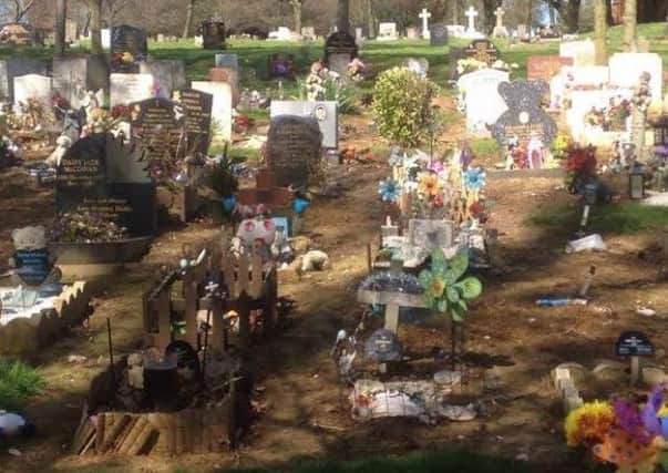 The council has apologised for the distress caused by the state of some graves - and could help to set up a new Friends of Doddington Road Cemetery Group