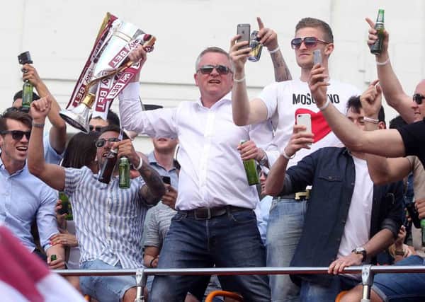 WANTED MAN - Chris Wilder, pictured here enjoying the champions parade celebrations on Sunday, is to hold talks with Charlton Athletic
